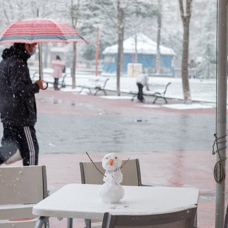 Snow covering mountains and roads in Spain during spring weather change