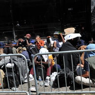 People waiting during Spain’s migrant regularisation application process