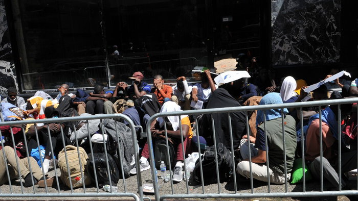 People waiting during Spain’s migrant regularisation application process