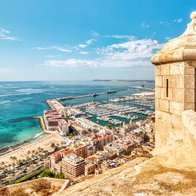 General view of Santa Barbara Castle overlooking Alicante city and coastline