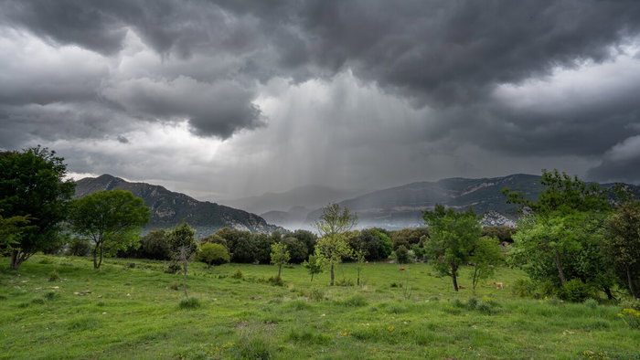 Dark storm clouds over inland Spain during unstable weather