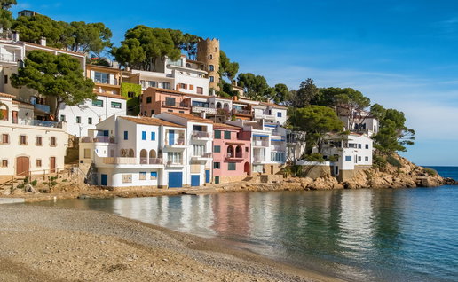 Coastal houses in Spain with rising property prices affecting expat buyers