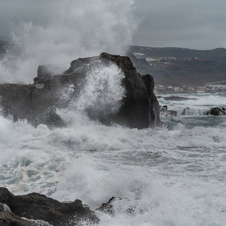Large waves crashing against rocky northern coast of Canary Islands during storm