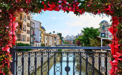 Farmers using modern irrigation systems in agricultural fields in Orihuela