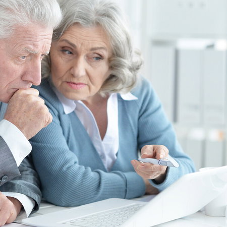 American expat checking Social Security documents in Spain