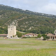 Rural landscape with hills and buildings near San Miguel de Salinas in the Sierra Escalona area