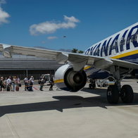 Passengers boarding a Ryanair plane as airline warns of delays from new border checks