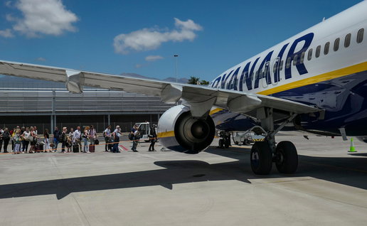Passengers boarding a Ryanair plane as airline warns of delays from new border checks