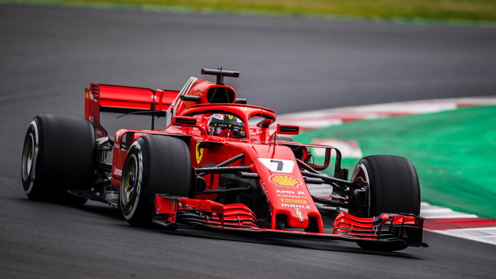 Ferrari racing on Formula One track