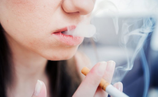 Young woman smoking a cigarette