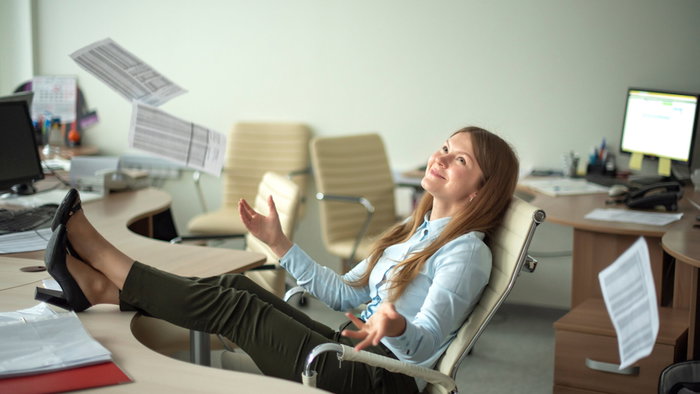Woman in the office at the end of the work week
