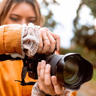 Woman taking pictures on cameria