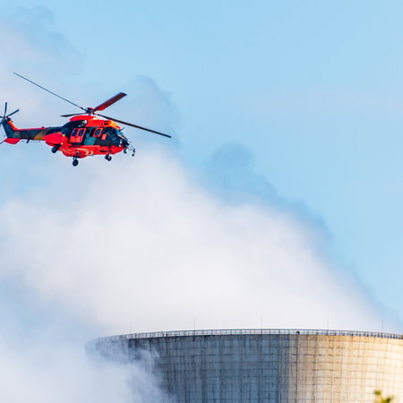 Helicopter crew inspects Ascò nuclear plant.
