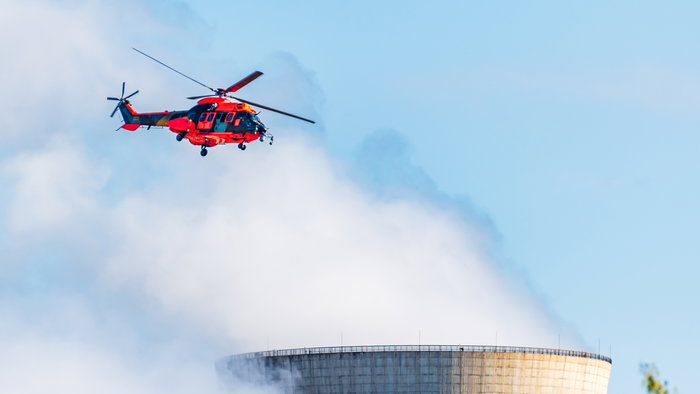 Helicopter crew inspects Ascò nuclear plant.