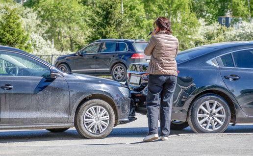 Woman involved in a car collision on the phone