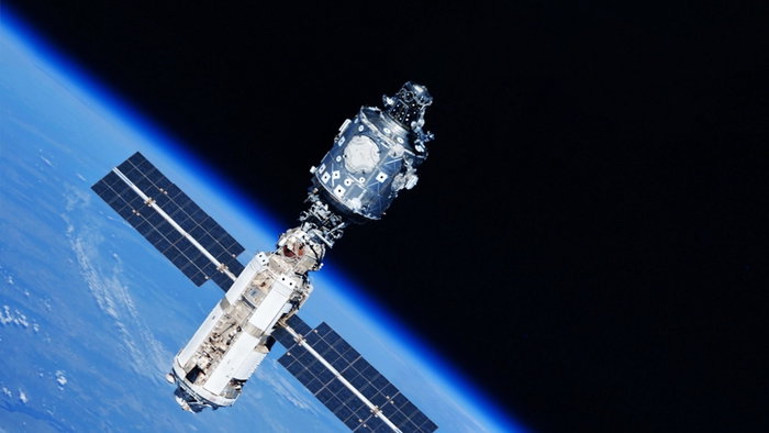 A space satellite above the Earth's surface. Elements of this image furnished by NASA. High quality photo