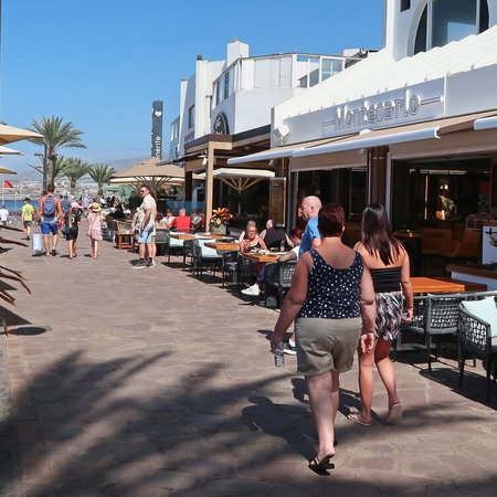 People walking on a promenade