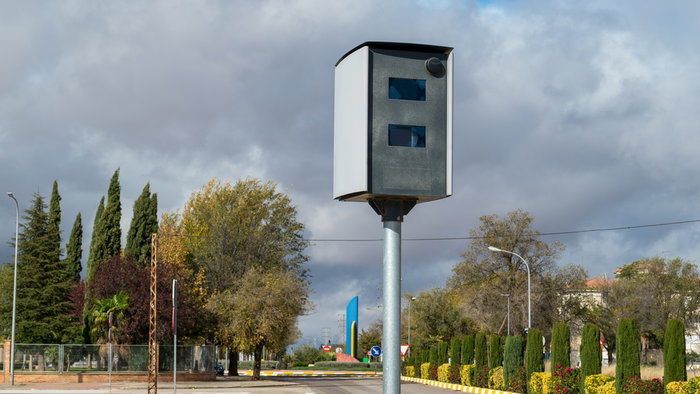 Roadside traffic speed camera monitoring drivers on a street in Spain