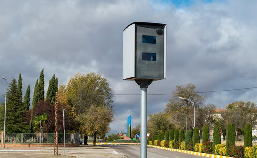 Roadside traffic speed camera monitoring drivers on a street in Spain
