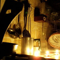 kitchen illuminated by tea candles