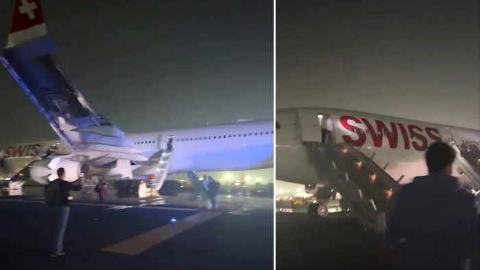 Swiss flight to Zurich evacuates all passengers via slides.