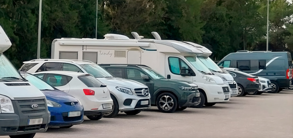 Who lives in those motorhomes and camper vans outside the Costa del Sol Hospital, Marbella?