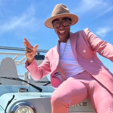 Car overtaking cyclists without safe distance on Spanish road captured by DGT aerial camera