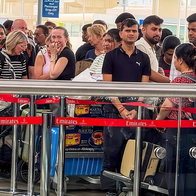 Passengers queuing to go through new EES passport control.