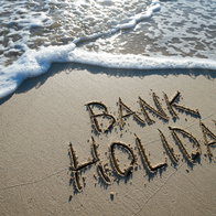 Bank holiday message written on a beach as Spain confirms new May holidays for some workers in 2026.