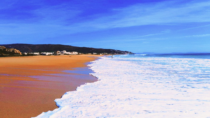 Blue sky and sandy beach in Spain