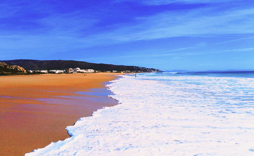 Blue sky and sandy beach in Spain