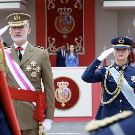 The king and princess of Spain dressed in military attire