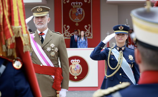The king and princess of Spain dressed in military attire