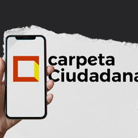 A smartphone displaying Spain’s Mi Carpeta Ciudadana app logo used for official paperwork and digital notifications.
