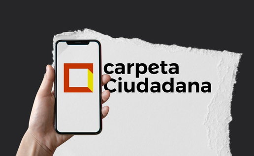 A smartphone displaying Spain’s Mi Carpeta Ciudadana app logo used for official paperwork and digital notifications.