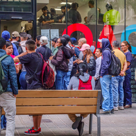 Long queues outside a citizen advice and immigration service centre in Barcelona
