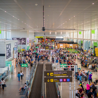 Passengers queueing to board there flights in Malaga airport