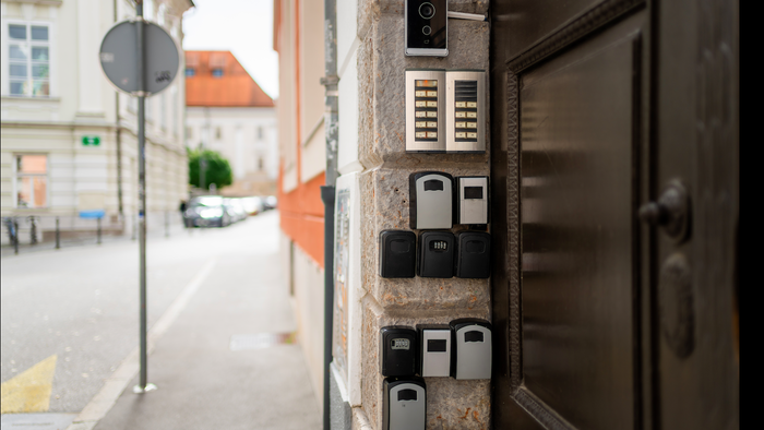 Security key holders on th wall of an apartment building in Spain