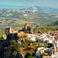 A village in Spain sat on a hill with a castle