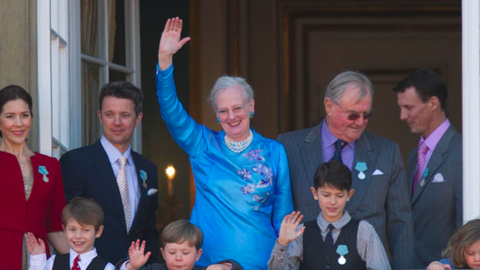 The Danish royal family on a balcony