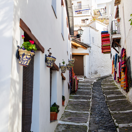 White washed walls of a street in Pampaneira in La Alpujarra