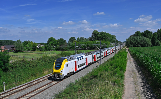 A train in Belgium travel through the countryside