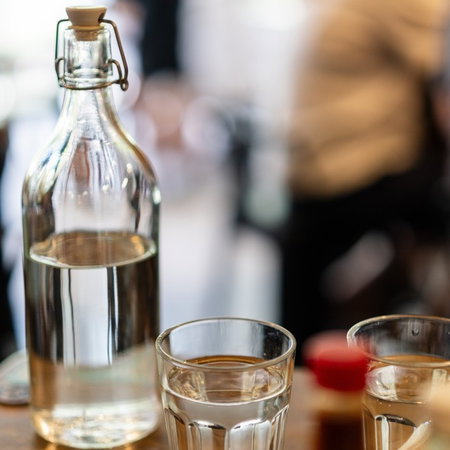 Tap water being served in a restaurant