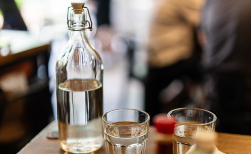 Tap water being served in a restaurant
