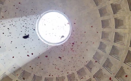 Millions of rose petals fall from Pantheon roof.