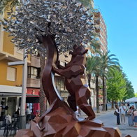 Villena unveils giant sculpture to honour creator of Madrid’s famous bear statue.