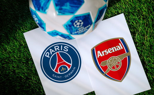 Football with Champions Leauge logo with the club logos for Arsenal & PSG