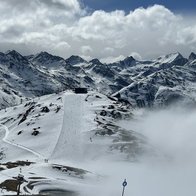 View of snowy mountines with blue skies in St Anton Am Arlberg in Austria
