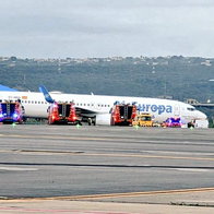 Emergency vehicles surround an Air Europa plane at Palma Airport after a wheel reportedly came off during landing.