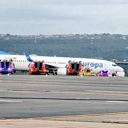 Emergency vehicles surround an Air Europa plane at Palma Airport after a wheel reportedly came off during landing.